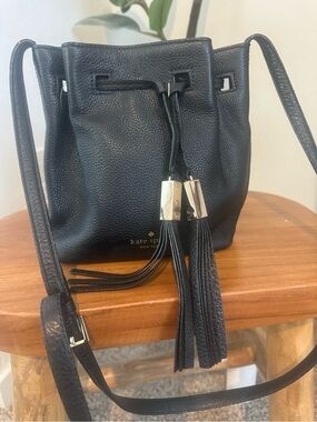 kate spade black pebbled leather tassel drawstring crossbody bag